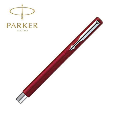 Parker Vector pen writing on a professional journal.