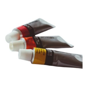 Fabric paint tube caps Fabric paint tube caps on white background
