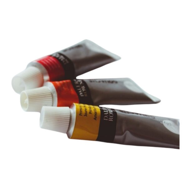 Fabric paint tube caps on white background