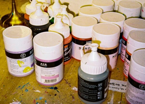Metallic acrylic paint bottles