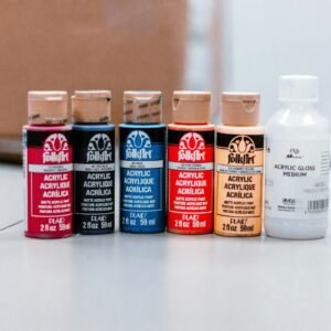 Pouring acrylic paint bottles