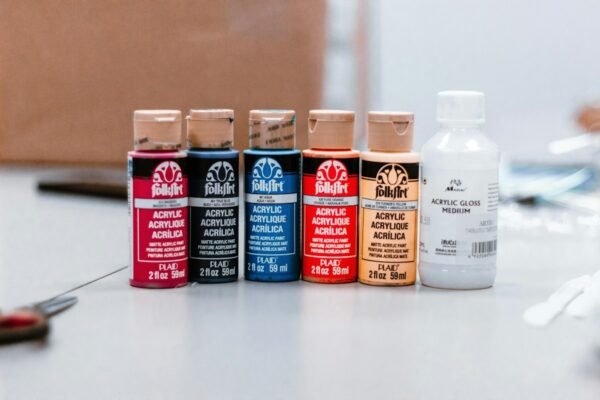 Pouring acrylic paint bottles